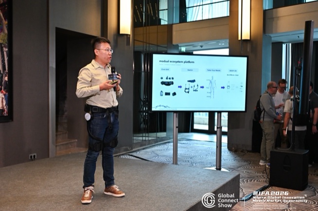 A speaker presents a product lineup on stage at GCS @IFA 2026