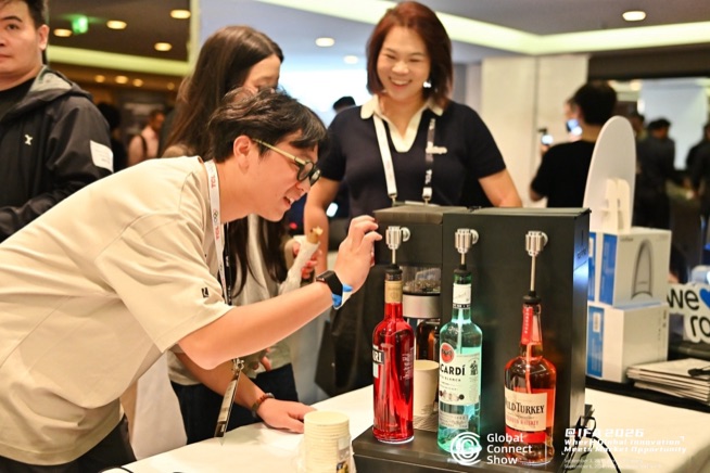 An attendee tries a product at a brand table, GCS @IFA 2026